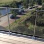 Zicht vanop balkon met een glasbalustrade Solid Sky Zicht vanop balkon met een glasbalustrade Solid Sky